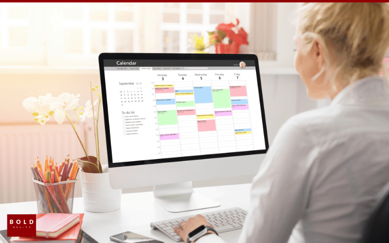 Person organizing schedule on computer for outpatient treatment at Bold Health.