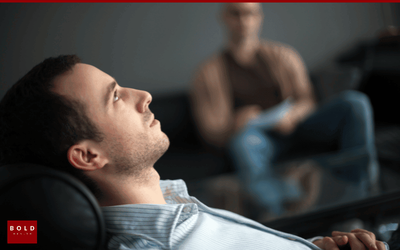 man reclined receiving therapy